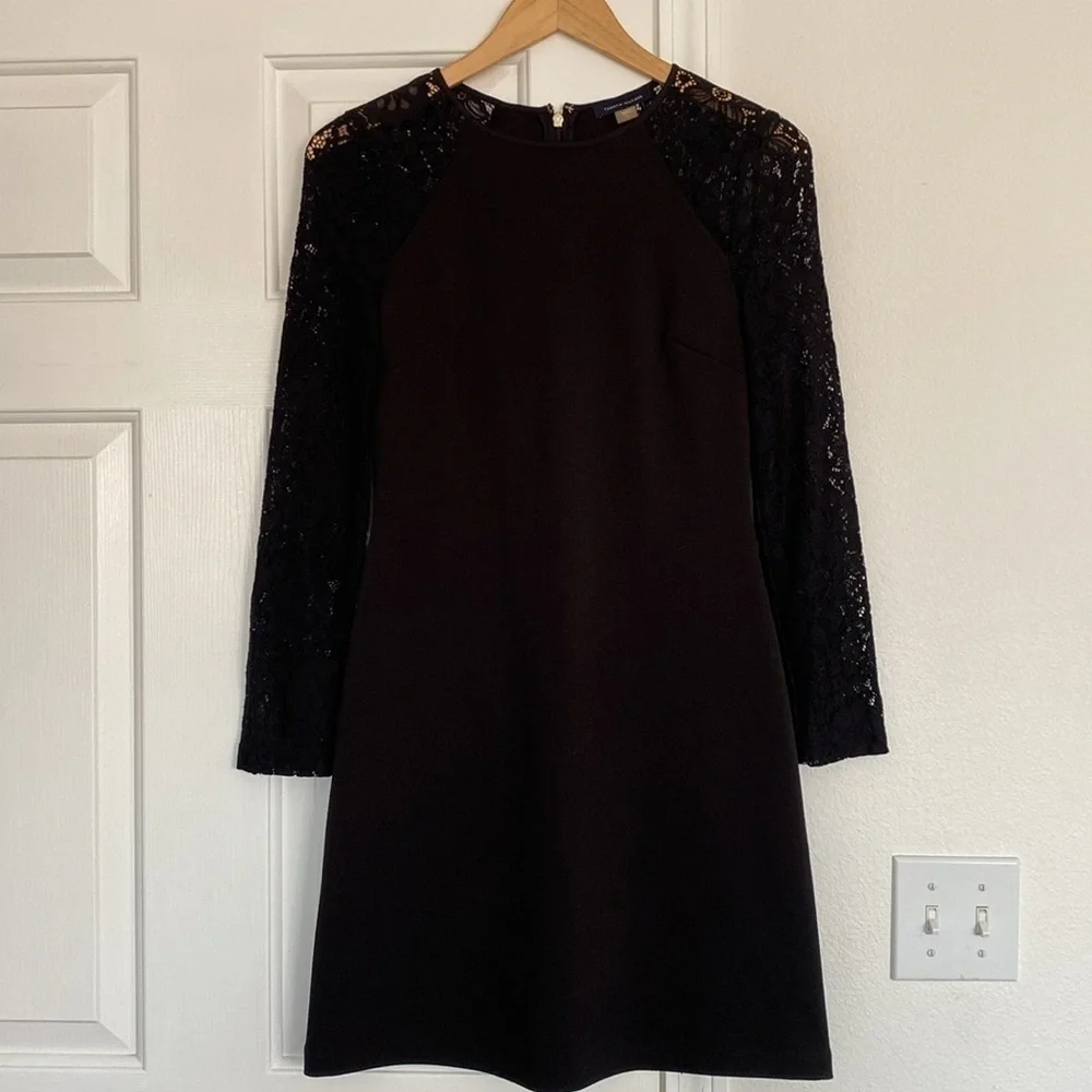 Tommy Hilfiger little black dress with long sleeves lace sleeves.